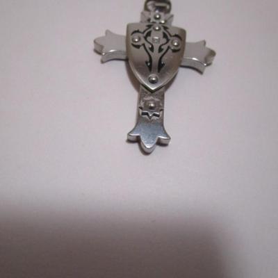 2 crosses  (one is 1-3/4" x 1-1/4" Black & Blue brand;  one is 1-1/2" x 1") both with tiny stone, no chains