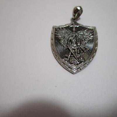 3 pendants - one Shield (1-1/2" x 1"), Circle is 1-1/4" diameter, Chinese characters is 3/4"