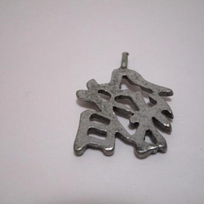 3 pendants - one Shield (1-1/2" x 1"), Circle is 1-1/4" diameter, Chinese characters is 3/4"
