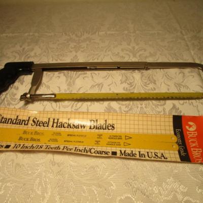 Hacksaw with 2 replacement blades
