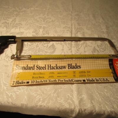 Hacksaw with 2 replacement blades