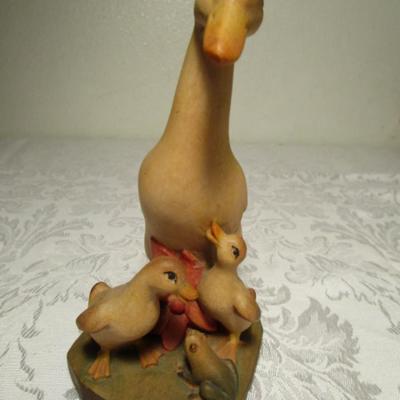 Hand-carved boy with goose