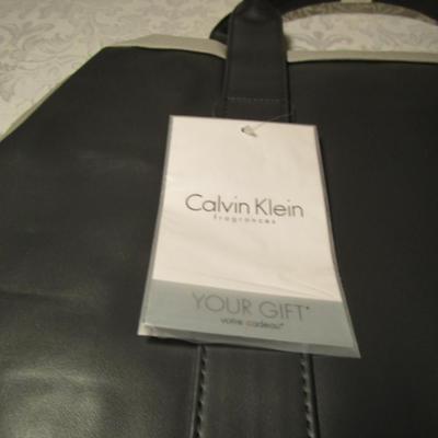 Sale Photo Thumbnail #610: New, Says "Calvin Klein Frangrances" on it, 18-1/2" wide x 7-3/4" deep x 9-1/2" tall see pictures