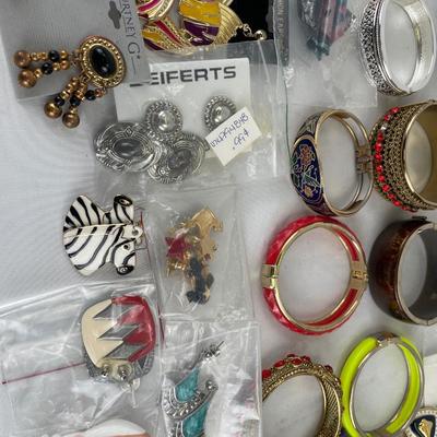 Cuff bracelets and post earrings