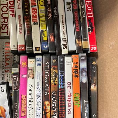 Netgear and a box full of DVDs