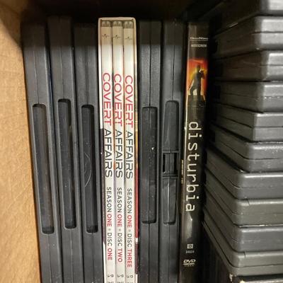 Netgear and a box full of DVDs