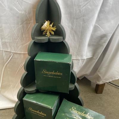 Snowbabies in boxes with tree shelf decor