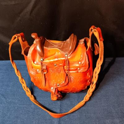 VERY UNIQUE LEATHER TOOLED PURSE WITH SADDLE