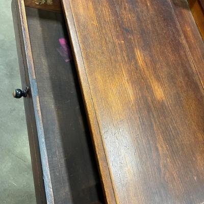 Darker wood antique library desk