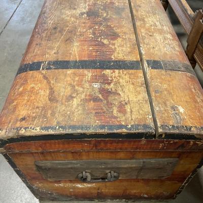 Antique wood chest with metal handles