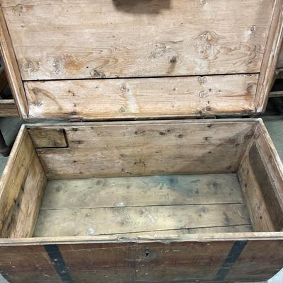Antique wood chest with metal handles