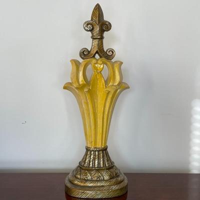 Yellow and Gold Decorative Statue