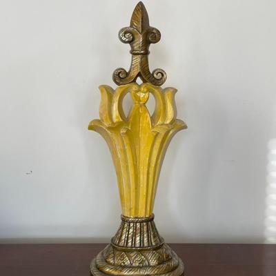 Yellow and Gold Decorative Statue