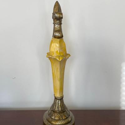 Yellow and Gold Decorative Statue