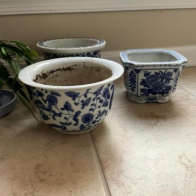 Sale Photo Thumbnail #1066: Lot includes: Blue & White Flower Pots, Live Christmas Cactus, Picture Frame and Glass Vases