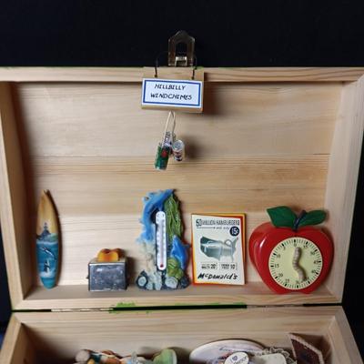 WOODEN CHEST FULL OF FRIDGE MAGNETS