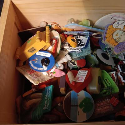 WOODEN CHEST FULL OF FRIDGE MAGNETS