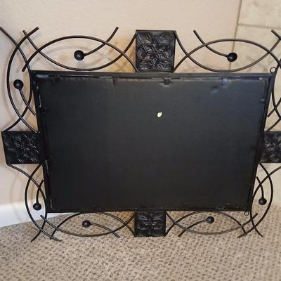 Decorative metal framed mirror