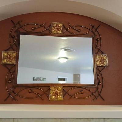 Decorative metal framed mirror