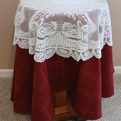 Plant stand - homemade small round table with tablecloth, lace, and Doiley
