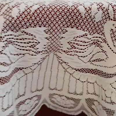Plant stand - homemade small round table with tablecloth, lace, and Doiley