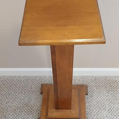 Plant stand - homemade small round table with tablecloth, lace, and Doiley