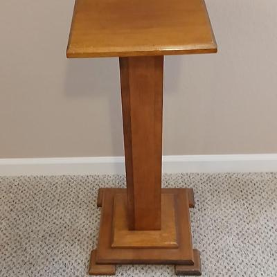 Plant stand - homemade small round table with tablecloth, lace, and Doiley