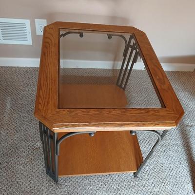 Glass topped metal framed end table