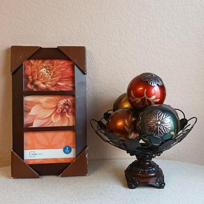 Metal decorative bowl with leaves and decorative balls inside with a brand-new picture frame
