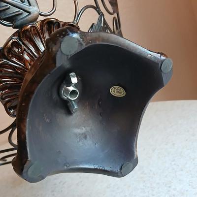 Metal decorative bowl with leaves and decorative balls inside with a brand-new picture frame
