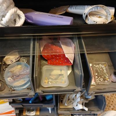 Multi drawer organizer with sewing items - thread - needles - elastic - and two sewing books