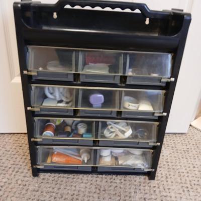 Multi drawer organizer with sewing items - thread - needles - elastic - and two sewing books