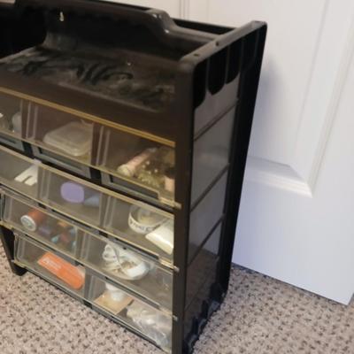 Multi drawer organizer with sewing items - thread - needles - elastic - and two sewing books