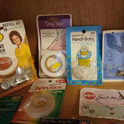 Sew Smart book with mostly new in the package sewing supplies