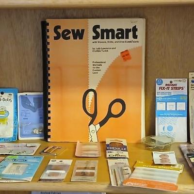 Sew Smart book with mostly new in the package sewing supplies