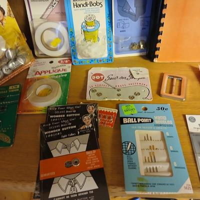 Sew Smart book with mostly new in the package sewing supplies