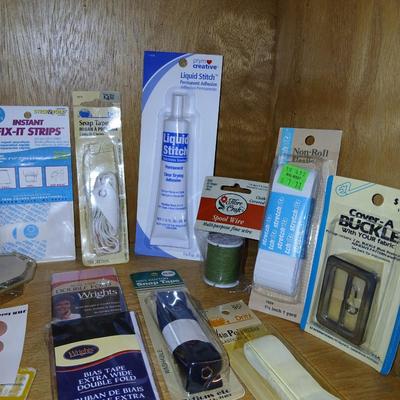 Sew Smart book with mostly new in the package sewing supplies