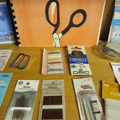Sew Smart book with mostly new in the package sewing supplies