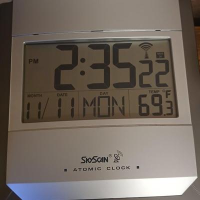 Panasonic cordless phone set and a Sky-Scan Atomic clock