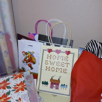 Almost everything needed for gift wrapping - for all events - with bags, wrapping paper storage, tissue paper, bows & more!