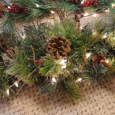 Two beautiful prelit garland Christmas mantle center pieces