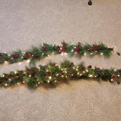 Two beautiful prelit garland Christmas mantle center pieces