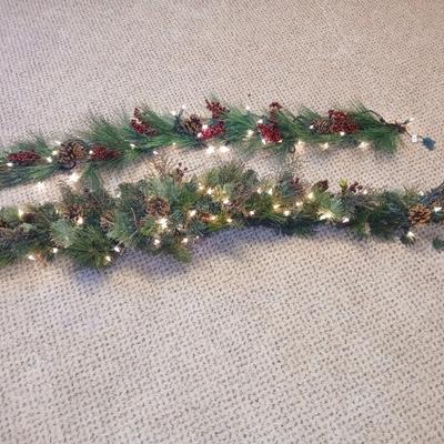 Two beautiful prelit garland Christmas mantle center pieces