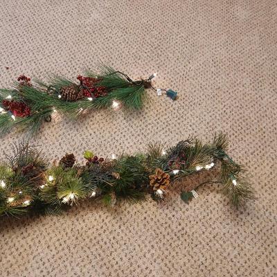 Two beautiful prelit garland Christmas mantle center pieces