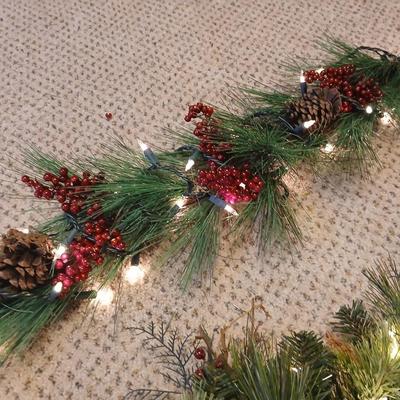 Two beautiful prelit garland Christmas mantle center pieces
