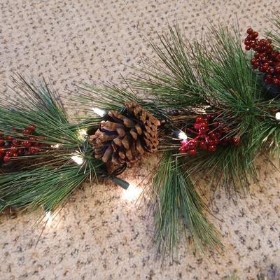 Two beautiful prelit garland Christmas mantle center pieces