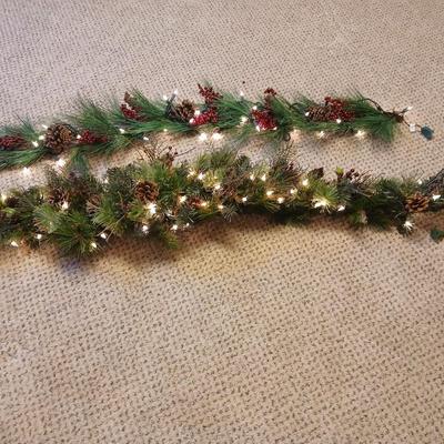 Two beautiful prelit garland Christmas mantle center pieces