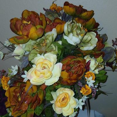 Faux flowers Boquet's and door swaths with glass vases