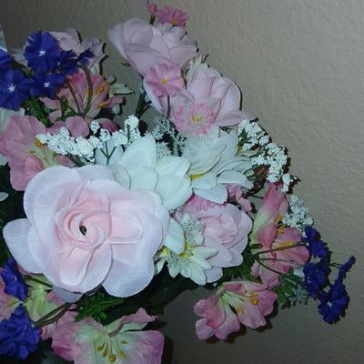 Faux flowers Boquet's and door swaths with glass vases