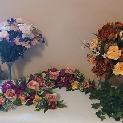 Faux flowers Boquet's and door swaths with glass vases